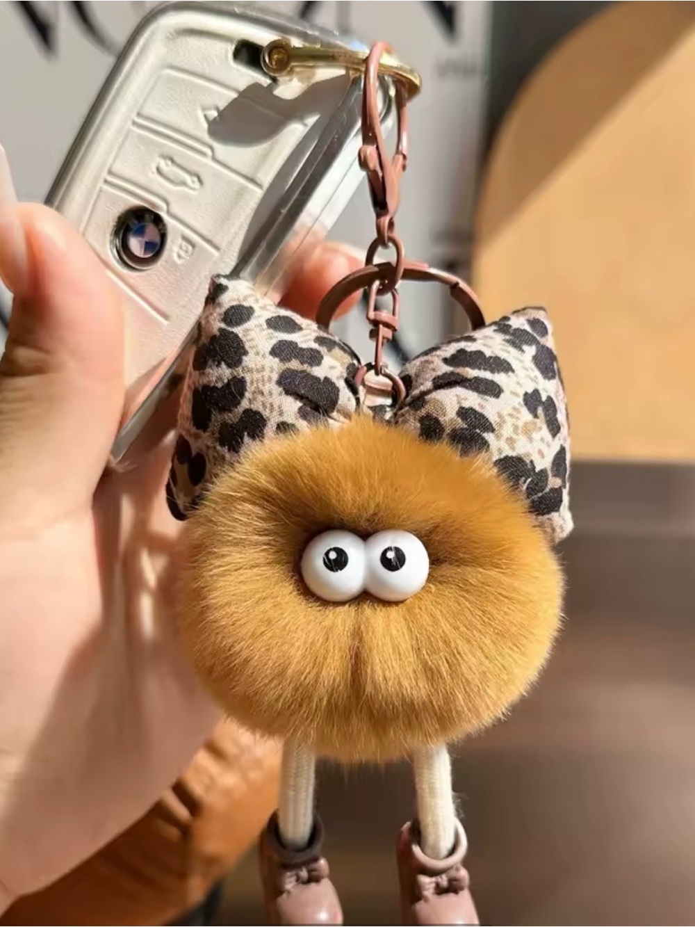 Fuzzy Pom Pom Keychain with Leopard Bow and Cute Eyes